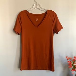 Women’s ‘a new day’ V-neck t-shirt size Medium